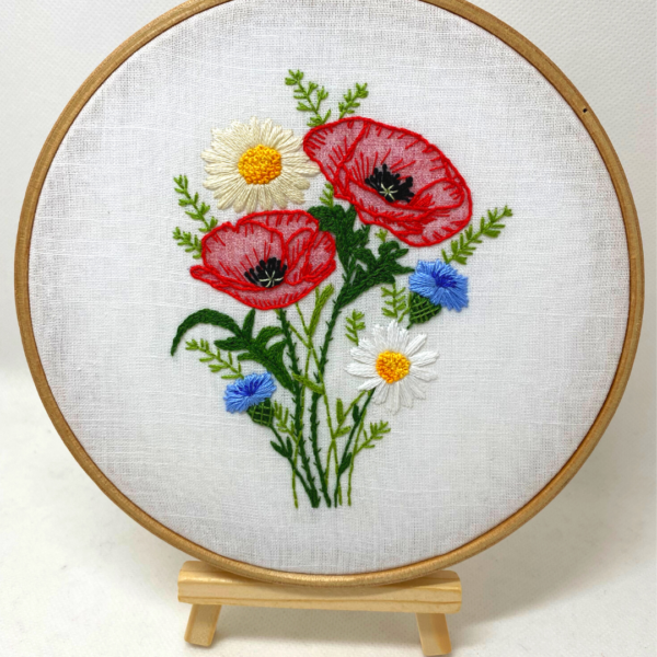 Picture of a poppy, daisy and cornflower embroidery hoop